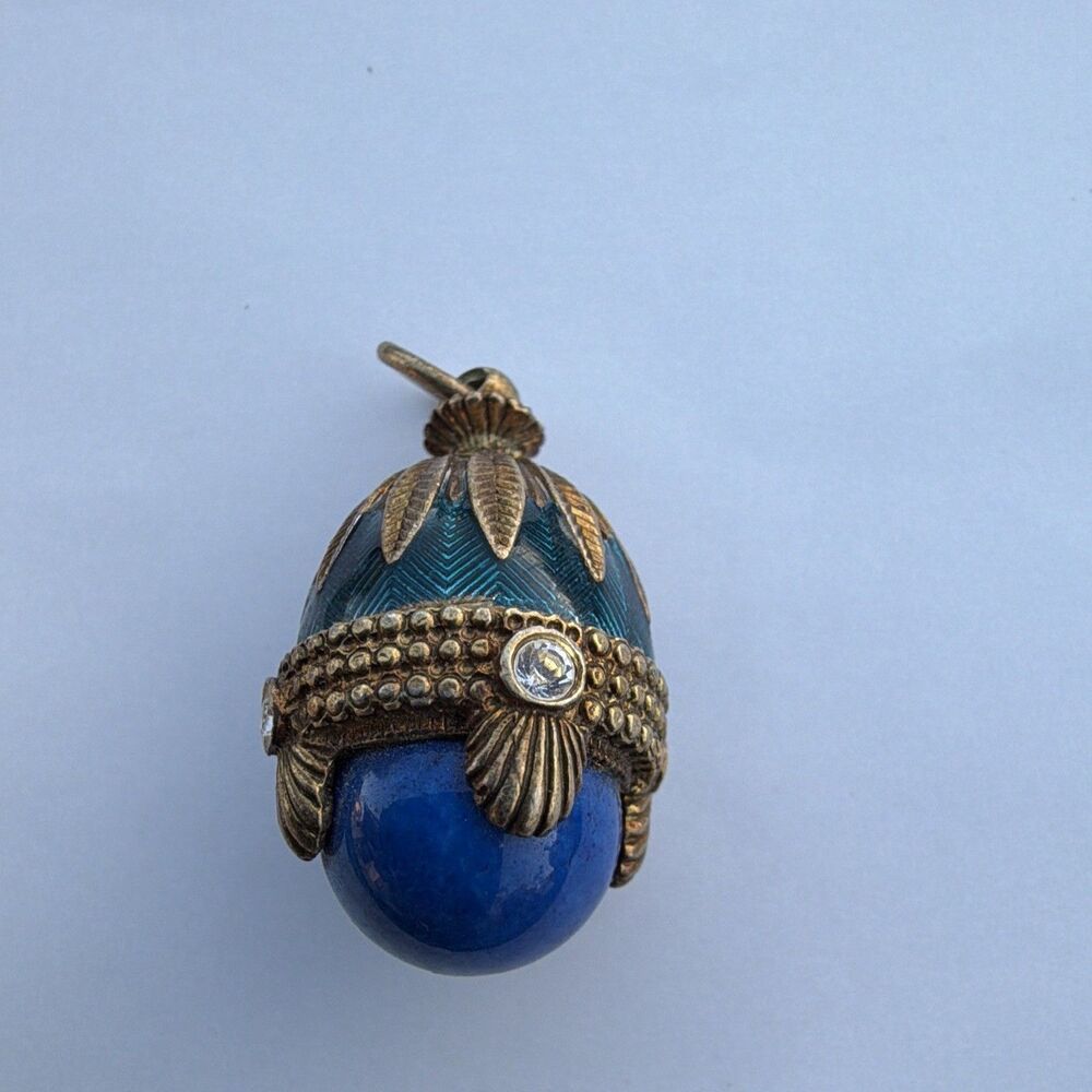 Faberge-inspired blue guilloche enamel and lapis lazuli egg pendant